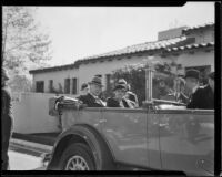 Herbert Hoover and Lou Henry Hoover riding in a convertible automobile with the top down, Los Angeles, 1932