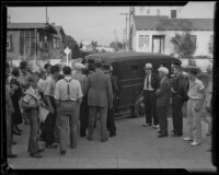 Police patrol car probably assigned to collect dance marathon participants at at Jack Kearns dance marathon, Los Angeles, probably 1934