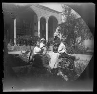 American missionary William Whipple photographing his family at their home, Tabrīz, Iran, 1891