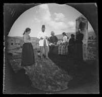 Yuseph Effendi Tartarian with his family and William Sachtleben on his sod roof top, Erzurum, Turkey, 1891