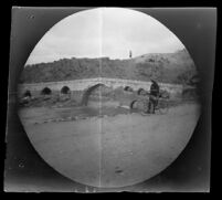 William Sachtleben gazing at the old bridge on the road from Sivas to Erzincan, Turkey, 1891