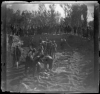 Armenian massacre victims interred in a mass grave in the Armenian Gregorian Cemetery, Erzurum, Turkey, 1895