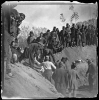 Armenian massacre victim interred in a mass grave in the Armenian Gregorian Cemetery, Erzurum, Turkey, 1895