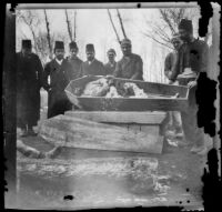 Armenian massacre victim in a coffin in the Armenian Gregorian Cemetery, Erzurum, Turkey, 1895