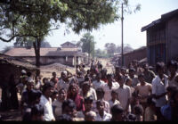Gangadhar Nagar - villagers gathered outside of the off-camera researchers' jeep, Hubli (India), 1984