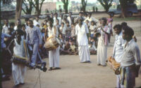 Nāiyāndī Mēḷam ensemble - Villagers watch as the ensemble is recorded, Usilampatty (India), 1984