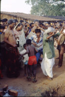 Gangadhar Nagar - Chandappa Jampana Kattimani smiles at his young grandson dancing, Hubli (India), 1984