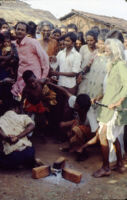 Gangadhar Nagar - Chandappa Jampana Kattimani, Haranśikārī leader, watches his son and grandson participate in a ritual, Hubli (India), 1984