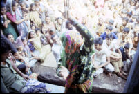 Gangadhar Nagar - Haranśikārī / Haran Shikari community gathered as Gopibai Sivlal, a Kanjar Bhāṭ woman, dances, Hubli (India), 1984