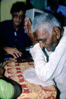Doreswami listens to A. A. Bake’s 1938 recordings, reacts, and identifies some of them, Madurai (India), 1984