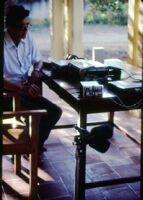 Nazir Ali Jairazbhoy with recording equipment, Usilampatty (India), 1984