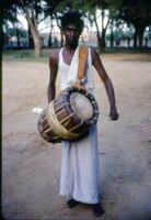 Nāiyāndī Mēḷam ensemble - A. K. Ganesan, a tavil musician, Usilampatty (India), 1984
