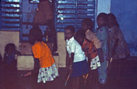 Children watch a Villupāttu (bow song) ritual, Kottaram (Tamil Nadu, India), 1984