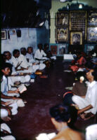 Tiruppati, leader of the Madurai Meenakshi Temple bhajan mandali, with singers, Madurai (India), 1984