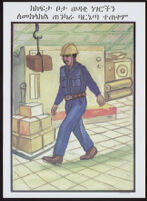 Man wearing safety gear walking through a work area [descriptive]