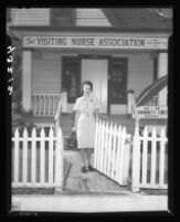 Florence Peters leaves the office of the Visiting Nurse Association, Los Angeles, 1946