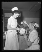 Nursing students measuring food at Los Angeles County General Hospital, Los Angeles, 1947