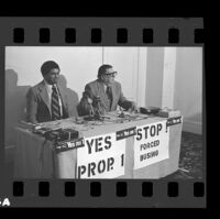 State Senator Alan Robbins with Howard Jarvis during a news conference to promote Robbins' antibusing measure Prop. 1, 1979