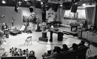 Dr. Eugene Scott recording his religious program on a live television set, Glendale, 1980