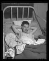 Male pateint in hospital bed at Camarillo State Hospital, Camarillo, 1940