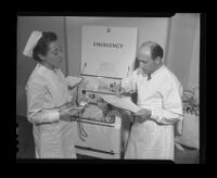 Dr. Jacob Frostig and Nurse Evelyn Bennet at Camarillo State Hospital, Camarillo, 1940