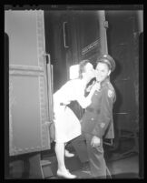 Army nurse Lt. Anne Wojcik and Pfc. Cecil Fleming aboard a train, Van Nuys, 1944