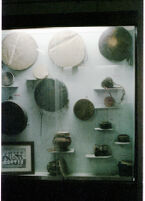 Museum display of sixteen membranophones, Pune (?) (India), 1984