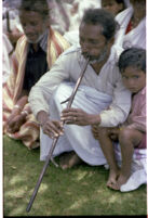 Kota man plays bugīr at an A. A. Bake playback session, Trichagadi (India), 1984