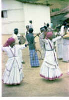 Kota men demonstrate tiruganāṭ dāk “turning dance” at an A. A. Bake playback session, Trichagadi (India), 1984