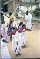 Kota women and girls dance in a circle, Trichagadi (India), 1984