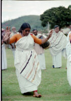 Kota woman dancing with raised hands, Kollimalai (India), 1984