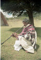 Toda man from Kotanad, Kotatu, plays a bhugri, Udagamandalam (India), 1984