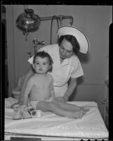 Eleanor Cammack King with Nurse Becky Lund after treatment at Hollywood Receiving Hospital, Los Angeles, 1936