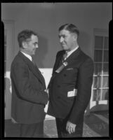Clark Waite shakes hands with his successor, Frank Rospaw, Los Angeles, 1936