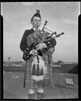 George Alexander Henry plays a bagpipe, Santa Ana, 1936