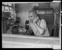 Harry B. Elliott uses the telephone, Los Angeles, 1936