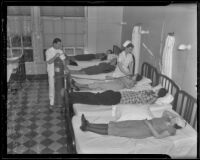 Nurses Alta May Stuart and William Partin treat patients Elizabeth Jones, Anne Morrissey, Rose Partridge, Constance Krueger, and June Price, Los Angeles, 1936