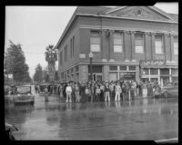 A crowd gathers after a robbery at the Southern County Bank, El Monte, 1936