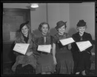 Aspiring actresses Louise Small, Wilma Francis, Jill Deen and Diana Gibson pose with their film contracts, Los Angeles, 1936