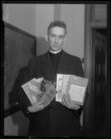 Reverend Charles Leahy stands holding several communist booklets, Los Angeles, 1936