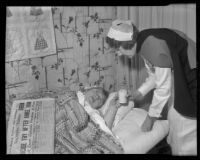 Nurse Carolyn Wells takes care of bedridden Vivian Denton after a failed suicide attempt, Los Angeles, 1936