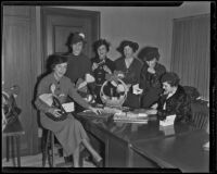 Ebell Club clubwomen pose while assembling boxes of candy, Los Angeles vicinity, 1936