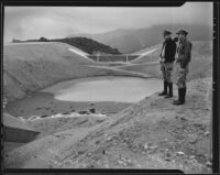 State officers Wayne Graham and O. A. Richmond inspect the Pickens Debris Basin, La Crescenta, 1936