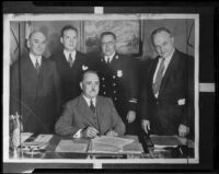 John M. Larronde, James Cairns, Bert M. Blake, & William O. Harris of the Board of Fire Commissioners stand behind Mayor Frank Shaw, Los Angeles 1936