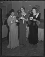 Mrs. Dolores M. Barrow, Mrs. Roger N. Herbert. and Mrs. Thomas Clark at a tea for the Los Angeles County Medical Association, Los Angeles, 1936
