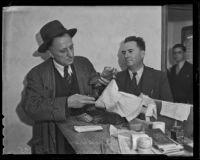 Deputy Sherriff Tom Humphries finds Chas Dalrymple with large sums of cash, Los Angeles, 1935