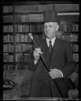 City Councilman Robert L. Burns models plug hat, Los Angeles, 1935