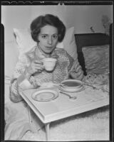 Helen Ferguson takes a meal in bed, Los Angeles, 1935
