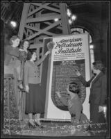 Dixie Miller, Virginia Andrews, Elizabeth Wilkes, Lezetta Buchterkirchen, and Alice Brakenbury with an oil rig in the Biltmore Hotel, Los Angeles, 1935