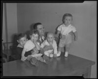 Judge Samuel R. Blake puts four orphans into homes just in time for the holidays, Los Angeles, 1935